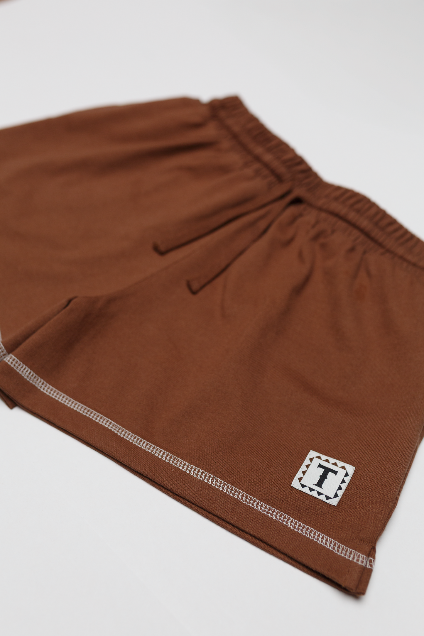 Tamaiti Logo Short
